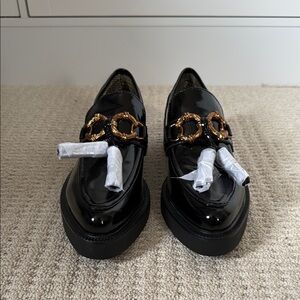 Black and Gold Patent Leather Flats with Gold Ornament